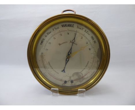 A Circular France Bregeut Variable Aneroid Barometer, brushed brass mount, approx 29 cms diameter.