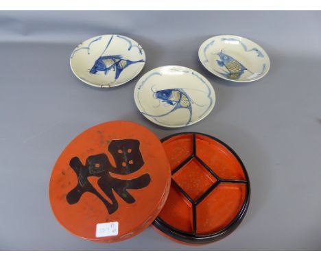 Three Chinese Ceramic Fish Plates, together with a red lacquer hors d' oeuvre tray and dishes. 