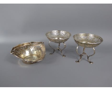 A Pair of Silver Bon Bon Dishes, both with pierced decoration on tripod base, Birmingham hallmark, mm William Hair Haseler, d