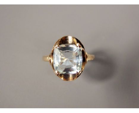 A Vintage 9ct Yellow Gold and Aquamarine Ring, the cushion-cut aquamarine measures approx 9 mm, size P, approx 3.4 gms.