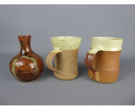 Three Winchcombe Pottery Stoneware items, including a part-glazed oatmeal and cream 1/2 pint beer mug potted by Ray Finch(196