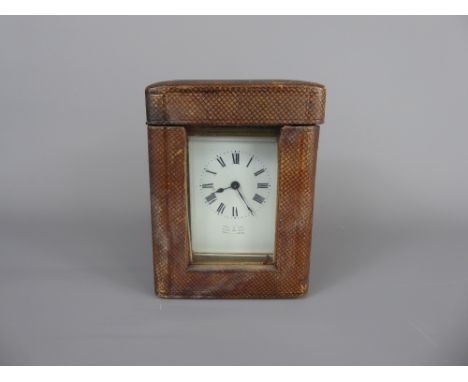 French Brass Carriage Clock, white enamel face with Roman dial, retailer Wall & Son, Ross on Wye, approx 8 x 7 x 11 cms, in t