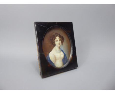 A 19th Century Portrait Miniature, depicting a young lady, in tortoiseshell frame, approx 6 x 7.5 cms, indistinct signature.