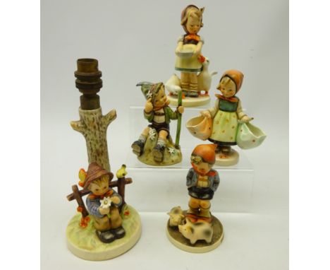 Four Goebel Hummel figurines and lamp base including; 'Mountaineer' & 'Farm Boy', H13cm, 'She Loves Me She Loves Me Not'  two