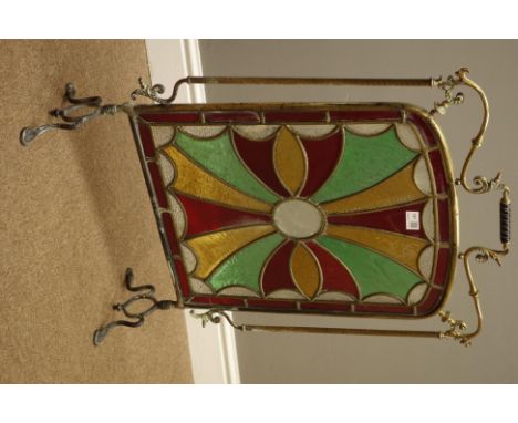 Early 20th Century Arts and Crafts brass and leaded glass fire screen on bracket feet, H76cm   Condition Report   Click here 