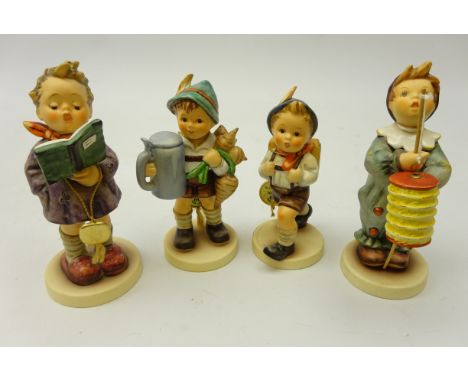 Four Goebel Hummel figurines, 'School Boy', 'Parade of Lights', 'For Father' and 'The Poet', H16cm, all boxed (4)   Condition