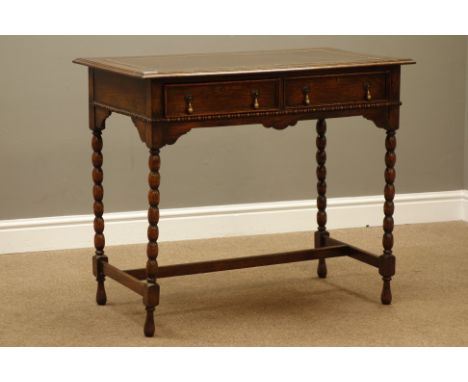 Early 20th century oak writing table, top inset with leather writing surface, two drawers, bobbin turned supports, W92cm, H75