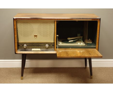 Mid 20th century Philips radiogram, fall front with turn table, on tapered supports with brass cups, W105cm, H81cm, D42cm