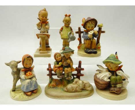 Six Goebel Hummel figurines including; 'Little Gardner', 'Band Leader', H14cm and four others (6)   Condition Report   Click 