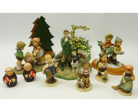 Four figurines including; 'Little Goat Herder' & 'Little Sweeper', two Goebel 1996 figures including 'Special Delivery', wood