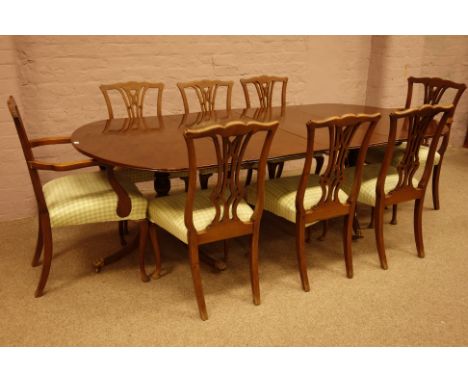 20th century Regency style mahogany twin pillar dining table, splayed supports with brass claw cups and castors (122cm x 142c