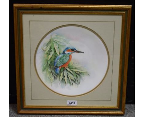 Julie Merry (contemporary) Kingfisher amongst Foliage, acrylic on ceramic panel, signed, label verso, 27cm diameter