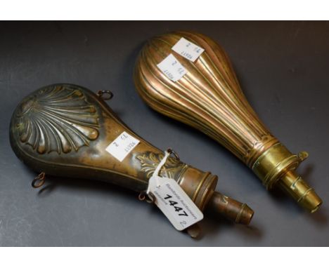 A 19th century copper shot flask; another embossed with an anthemion motif (2)