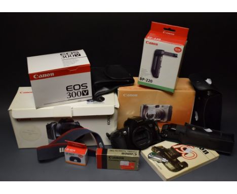 Photography - A Canon EOS 300V 35mm SLR camera body, boxed; A Canon BP-220 battery pack, boxed; A Canon EOS 500 35mm SLR came
