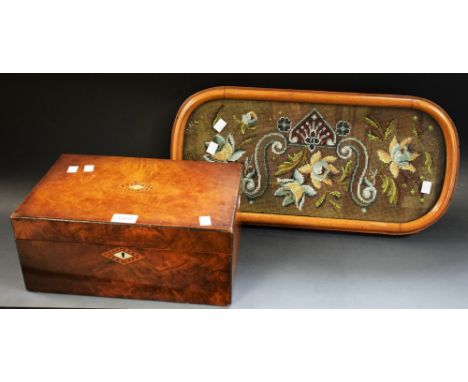 A Victorian walnut writing slope, diamond shaped mother of pearl and marquetry inlaid centre panel and escutcheon; a rounded 