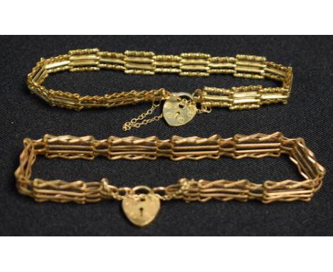 A lady's 9ct gold gate bracelet, heart shaped padlock, boxed; another similar, boxed 