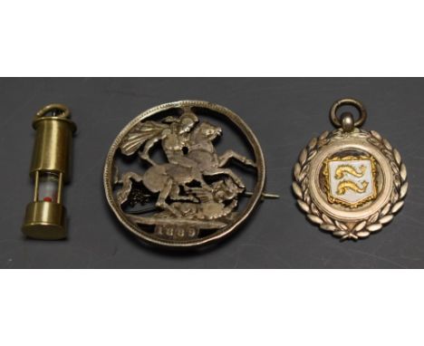 A pierced 1889 crown brooch; a silver fob; a miners lamp fob
