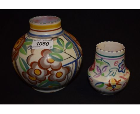 A Poole pottery ovoid vase, painted with flowers and foliage in bright shades of green, brown, ochre and blue, with geometric