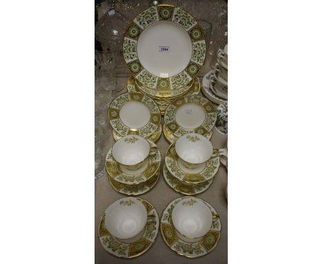 A Royal Crown Derby Green Derby panel six setting dinner and tea service