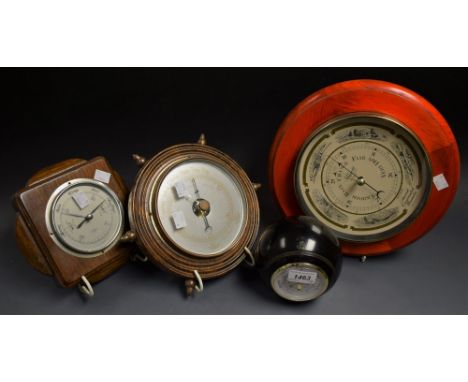 A novelty crown green bowling ball desk barometer; three other wall barometers (4)