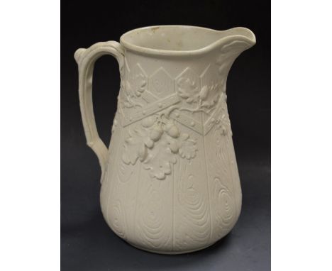A Copeland and Garrett relief moulded slip ware jug acorn and timber panel design impressed marks, 21cm high 