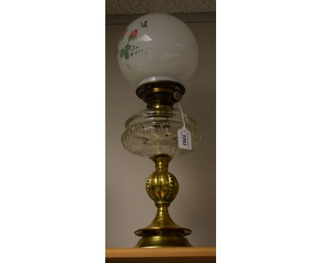A Victorian glass and brass oil lamp, Hinkes and Co. patent, milk glass shade, facetted clear glass reservoir, bulbous column