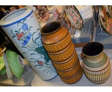 A large West German cylindrical vase; another baluster vase; an Oriental style stick stand 