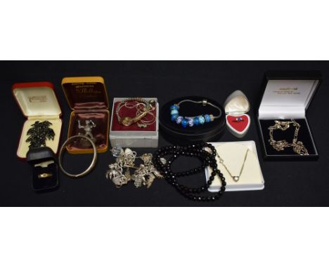 Jewellery - a lady's 9ct gold cased Avia wristwatch, a 9ct gold dress ring, others base metal;  silver charm bracelet with tw