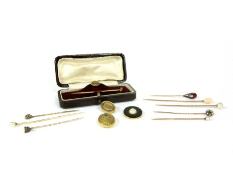 A quantity of stick pins, to include a cased single stone diamond stick pin, with interchangeable dress stud fitting, tested 