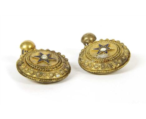 A pair of hollow shield form Etruscan revival earrings, enamel star motif and split pearl to the centre (one deficient), to h