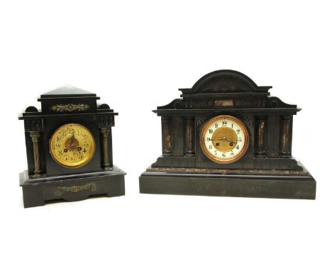 A Victorian black slate and variegated marble mantel clock, with white enamel chapter ring and Arabic numerals within an arch