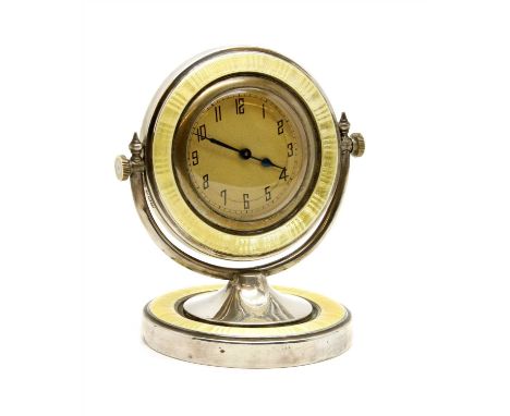 A Swiss silver and yellow enamel swivel desk clock, Hallmarks rubbed. 10cm high