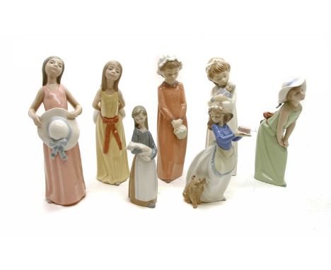 A collection of Lladro figures, together with two Nao figures (7)