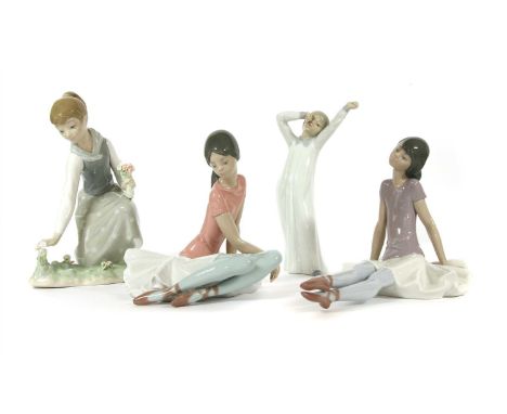 Two Lladro figures of ballerinas, one other Lladro figure group and a Nao figure (4)