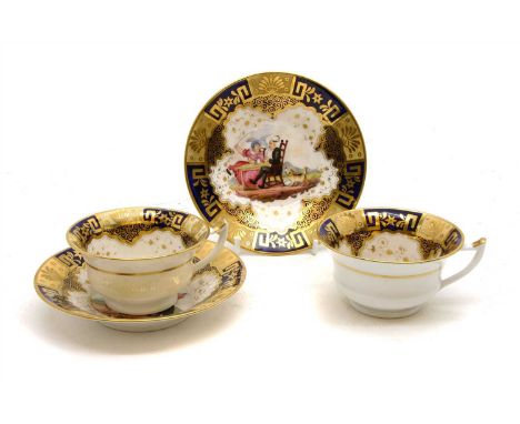 A pair of tea cups and saucers, possibly Rathbone, decorated with Dr Syntax satires, c.1830