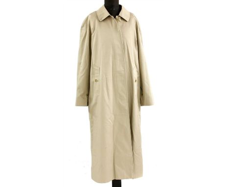 A ladies Burberry mackintosh trench coat, single breasted button up front, lined in Burberry's classic Haymarket cheque, size