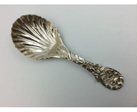 Cast silver caddy spoon in Rococo style by Thomas Bradbury &amp; Son, Sheffield 1936 