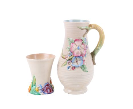 Two Clarice Cliff items. Including a Newport Pottery My Garden Series jug and a Wilkinson Ltd vase. Max. approximately H21cm
