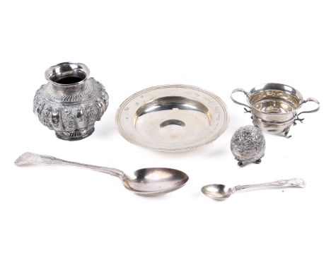 A small group of silver and white metal items. Comprising a silver wedding salver, hallmarked London 1975 and engraved with a