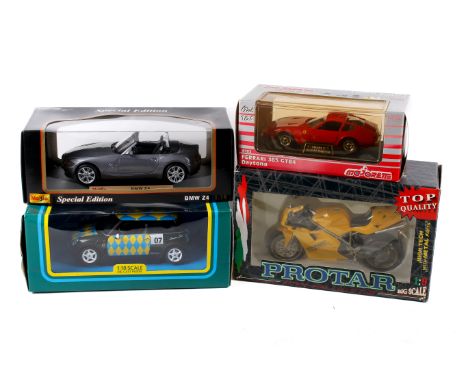 Four diecast model vehicles. Comprising a boxed Maisto 1:18 scale BMW Z4, boxed Mini Cooper Foxtons, boxed Majorette 4103 Fer