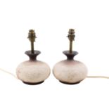 Waistel Cooper (1921 - 2003) a pair of studio art pottery textured table lamps.
