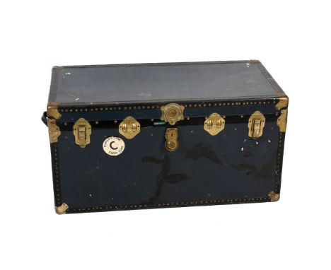 A  large blue steamer trunk. Lock and two clasps to the front, handles to both sides, opens to reveal a tray over a large sto