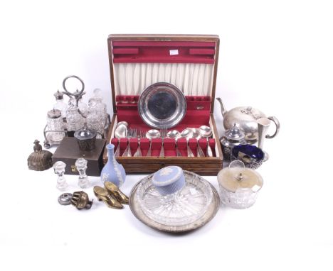 A collection of silverplate and other items, to include a six bottle cruet stand, a Victorian compressed round teapot, a glas