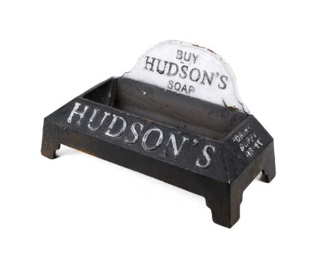 A cast metal 'Hudson's Soap' dog's drinking trough, painted black. H19cm