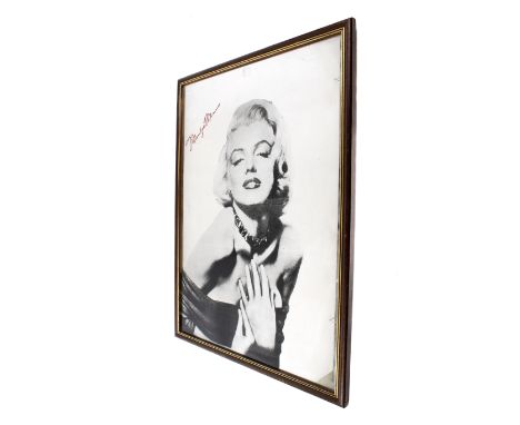 A vintage rectangular wall mirror with Marilyn Monroe. 44cm x 60cm. Framed