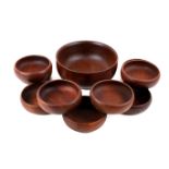 A set of ten mid-century Galatix Burma Teak bowls.