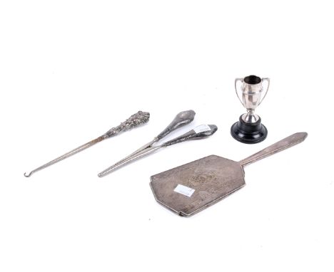 A small collection of vintage silver, mostly for the dressing table. Including glove stretchers, button hook, mirror and a sm
