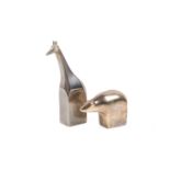 Two Dansk Designs Japan cast metal animal paperweights. Modelled as a polar bear and a giraffe. Max.