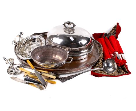 An assortment of silver plate. Including a Mappin & Webb ladle, a trumpet vase with engraved decoration, flatware and more