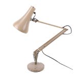A Herbert Terry & Sons Ltd anglepoise model 90 desk lamp. On a circular base.